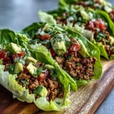 Low carb Turkey Taco Lettuce Wraps, bursting with savory meat and crisp greens.
