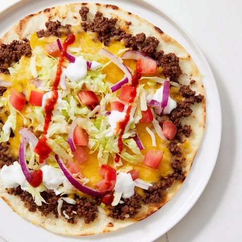 Golden, perfectly seared Crispy Smash Tacos brimming with fresh toppings and ready for a delicious bite.